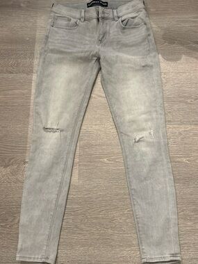 Express Women’s Light Gray Skinny Jeans with Knee Distress